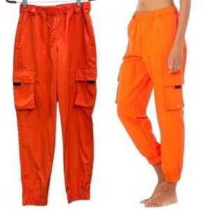 Alo Yoga It Girl Cargo Crush Pants in Tangerine